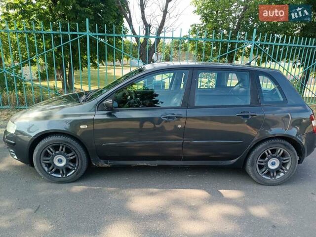 Серый Фиат Стило, объемом двигателя 2.45 л и пробегом 310 тыс. км за 4500 $, фото 1 на Automoto.ua
