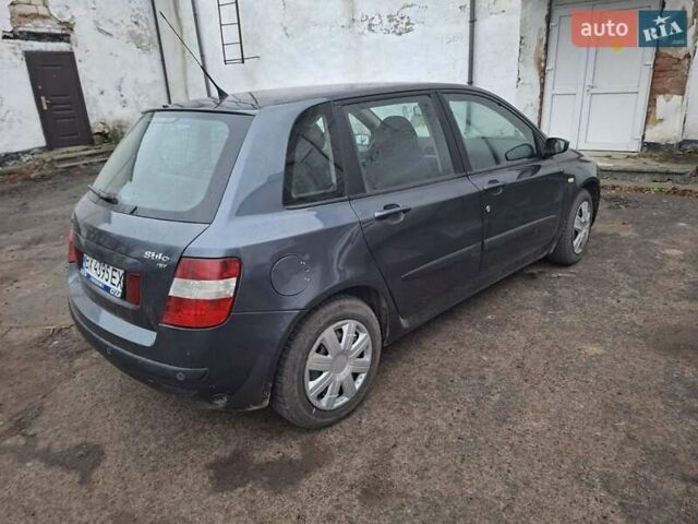 Серый Фиат Стило, объемом двигателя 1.8 л и пробегом 206 тыс. км за 2550 $, фото 2 на Automoto.ua
