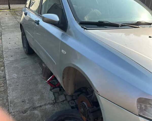 Серый Фиат Стило, объемом двигателя 1.91 л и пробегом 270 тыс. км за 1450 $, фото 1 на Automoto.ua