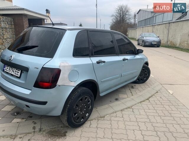 Сірий Фіат Стіло, об'ємом двигуна 1.91 л та пробігом 260 тис. км за 1999 $, фото 6 на Automoto.ua