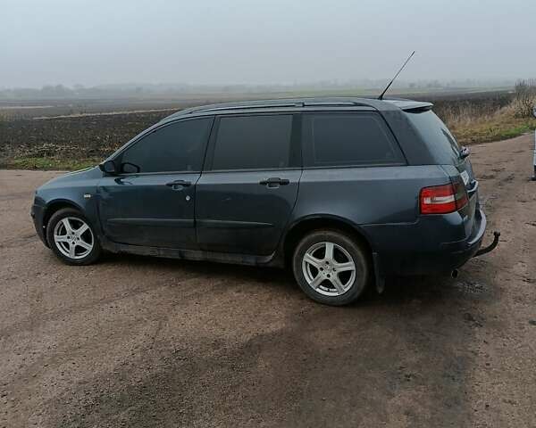 Серый Фиат Стило, объемом двигателя 1.91 л и пробегом 342 тыс. км за 3900 $, фото 4 на Automoto.ua