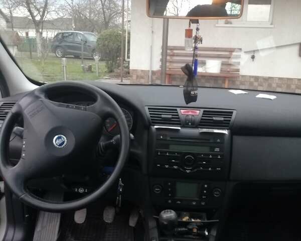 Серый Фиат Стило, объемом двигателя 1.6 л и пробегом 215 тыс. км за 3500 $, фото 4 на Automoto.ua