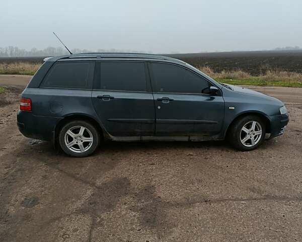 Серый Фиат Стило, объемом двигателя 1.91 л и пробегом 342 тыс. км за 3900 $, фото 1 на Automoto.ua