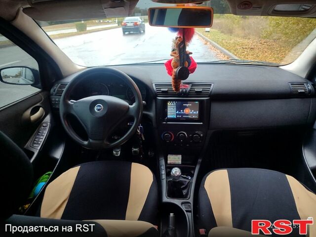 Серый Фиат Стило, объемом двигателя 1.9 л и пробегом 321 тыс. км за 4000 $, фото 8 на Automoto.ua