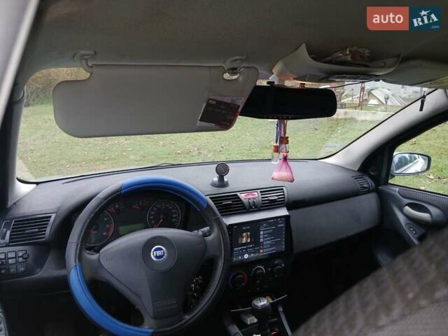 Серый Фиат Стило, объемом двигателя 1.6 л и пробегом 210 тыс. км за 3000 $, фото 4 на Automoto.ua