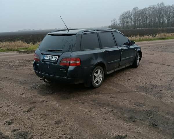 Серый Фиат Стило, объемом двигателя 1.91 л и пробегом 342 тыс. км за 3900 $, фото 2 на Automoto.ua