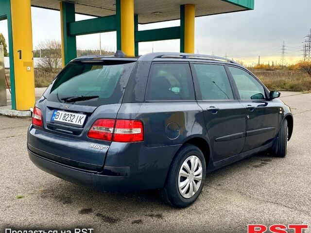 Серый Фиат Стило, объемом двигателя 1.6 л и пробегом 212 тыс. км за 3500 $, фото 10 на Automoto.ua