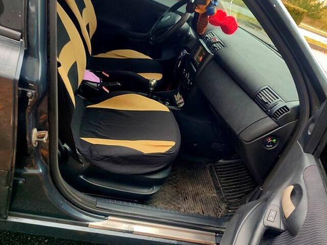 Серый Фиат Стило, объемом двигателя 1.9 л и пробегом 321 тыс. км за 4000 $, фото 7 на Automoto.ua