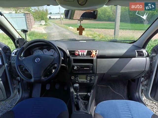 Сірий Фіат Стіло, об'ємом двигуна 1.6 л та пробігом 207 тис. км за 3600 $, фото 21 на Automoto.ua