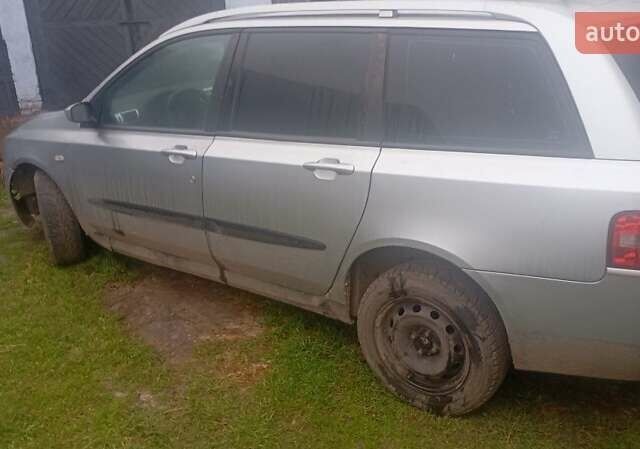 Серый Фиат Стило, объемом двигателя 1.9 л и пробегом 340 тыс. км за 3329 $, фото 5 на Automoto.ua