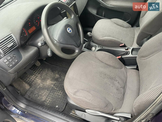 Синий Фиат Стило, объемом двигателя 1.91 л и пробегом 295 тыс. км за 2700 $, фото 13 на Automoto.ua