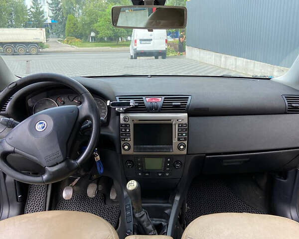 Синій Фіат Стіло, об'ємом двигуна 1.9 л та пробігом 350 тис. км за 1999 $, фото 18 на Automoto.ua