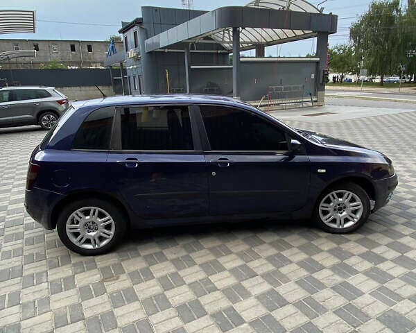 Синій Фіат Стіло, об'ємом двигуна 1.9 л та пробігом 350 тис. км за 1999 $, фото 9 на Automoto.ua