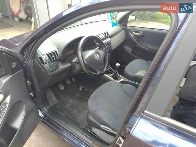 Синий Фиат Стило, объемом двигателя 1.6 л и пробегом 185 тыс. км за 3000 $, фото 5 на Automoto.ua