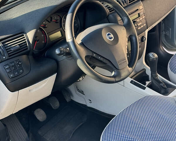 Синій Фіат Стіло, об'ємом двигуна 1.9 л та пробігом 132 тис. км за 4900 $, фото 8 на Automoto.ua