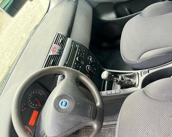 Синій Фіат Стіло, об'ємом двигуна 1.6 л та пробігом 350 тис. км за 2700 $, фото 8 на Automoto.ua