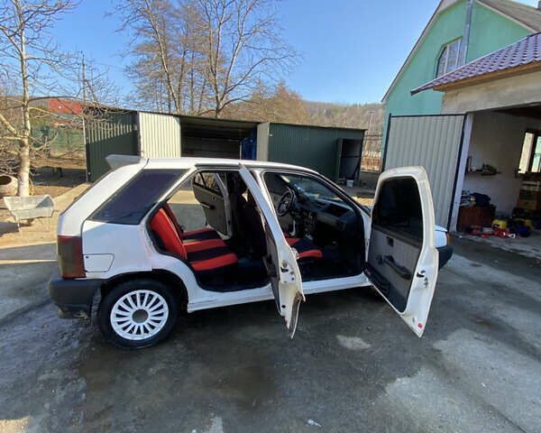 Белый Фиат Типо, объемом двигателя 1.35 л и пробегом 285 тыс. км за 1200 $, фото 12 на Automoto.ua