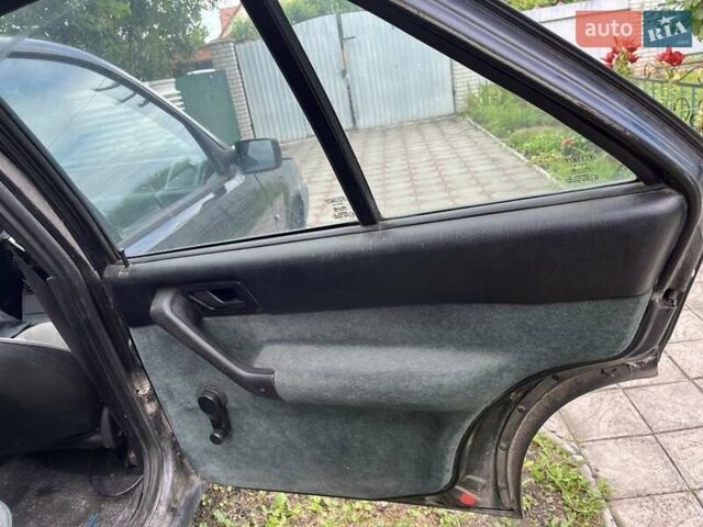 Черный Фиат Типо, объемом двигателя 1.8 л и пробегом 300 тыс. км за 400 $, фото 5 на Automoto.ua