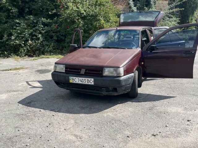 Червоний Фіат Тіпо, об'ємом двигуна 1.4 л та пробігом 328 тис. км за 777 $, фото 1 на Automoto.ua