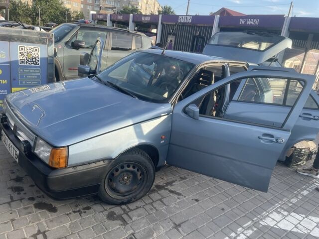 Серый Фиат Типо, объемом двигателя 1.4 л и пробегом 412 тыс. км за 1000 $, фото 1 на Automoto.ua