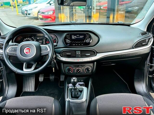 Серый Фиат Типо, объемом двигателя 1.4 л и пробегом 93 тыс. км за 8900 $, фото 8 на Automoto.ua