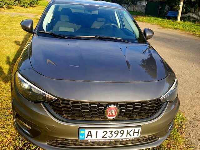 Серый Фиат Типо, объемом двигателя 1.4 л и пробегом 78 тыс. км за 9500 $, фото 6 на Automoto.ua