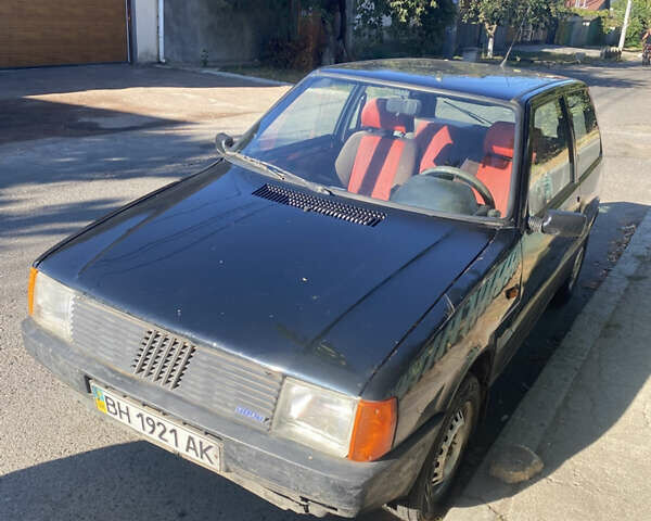 Чорний Фіат Уно, об'ємом двигуна 1 л та пробігом 200 тис. км за 950 $, фото 4 на Automoto.ua