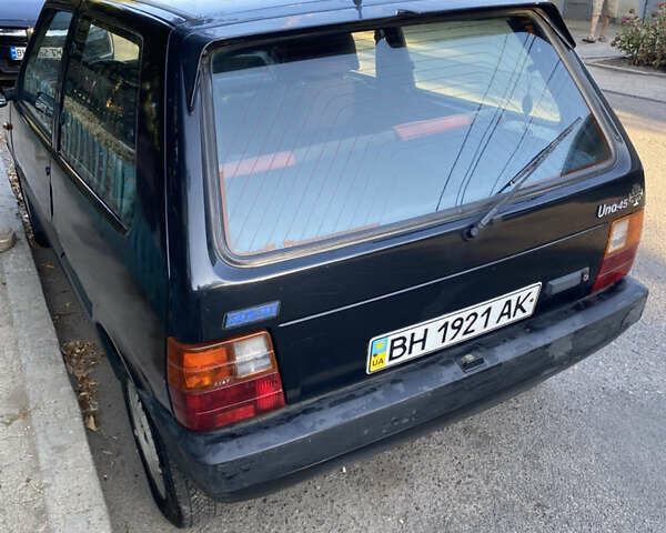 Чорний Фіат Уно, об'ємом двигуна 1 л та пробігом 200 тис. км за 950 $, фото 2 на Automoto.ua