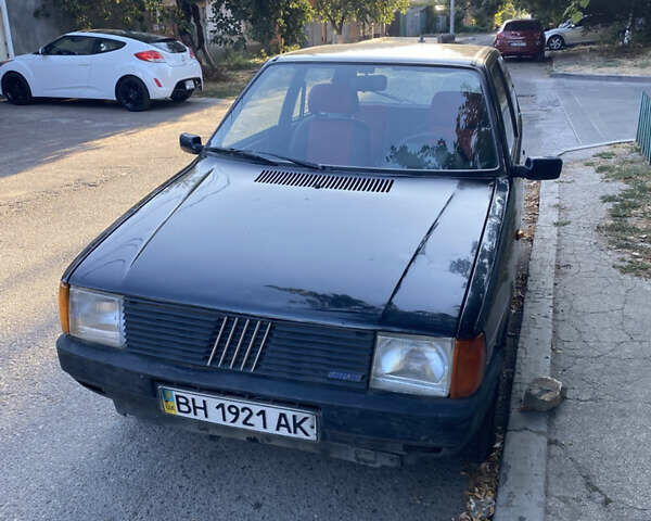 Чорний Фіат Уно, об'ємом двигуна 1 л та пробігом 200 тис. км за 950 $, фото 1 на Automoto.ua