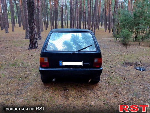 Черный Фиат Уно, объемом двигателя 1 л и пробегом 362 тыс. км за 750 $, фото 5 на Automoto.ua