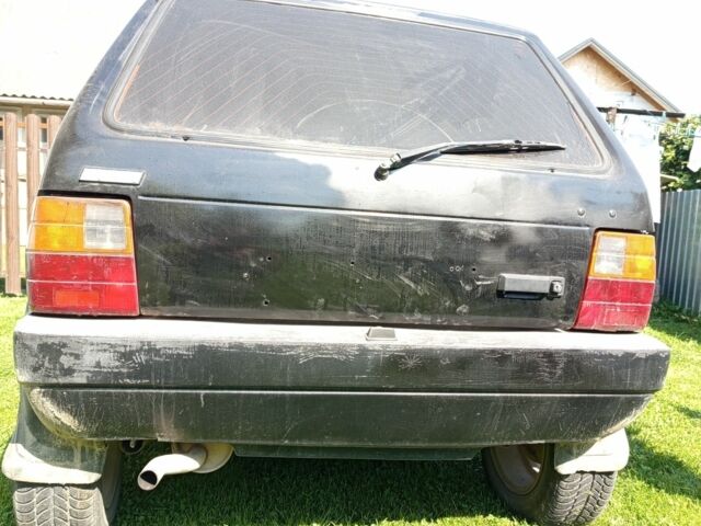 Черный Фиат Уно, объемом двигателя 1.5 л и пробегом 2 тыс. км за 1000 $, фото 4 на Automoto.ua