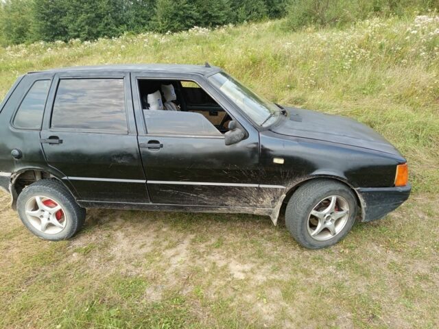 Черный Фиат Уно, объемом двигателя 1.5 л и пробегом 2 тыс. км за 1000 $, фото 2 на Automoto.ua