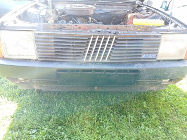 Черный Фиат Уно, объемом двигателя 1.5 л и пробегом 2 тыс. км за 1000 $, фото 3 на Automoto.ua