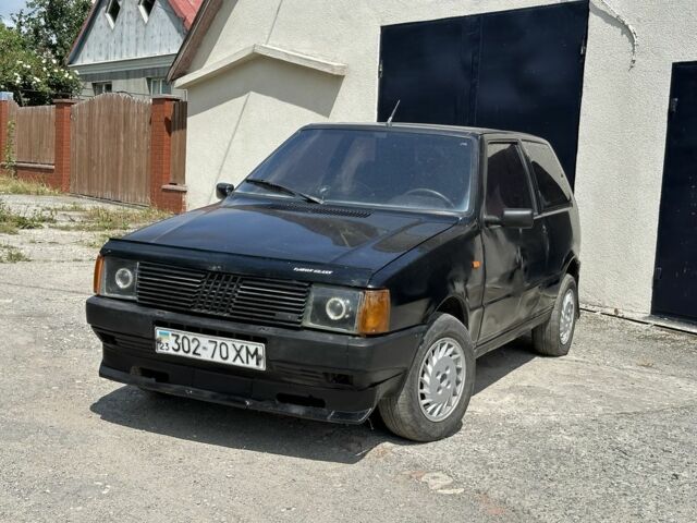 Черный Фиат Уно, объемом двигателя 1 л и пробегом 250 тыс. км за 800 $, фото 1 на Automoto.ua
