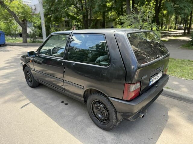 Черный Фиат Уно, объемом двигателя 1.4 л и пробегом 340 тыс. км за 1000 $, фото 6 на Automoto.ua