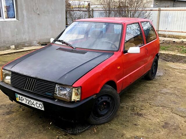 Красный Фиат Уно, объемом двигателя 1.3 л и пробегом 0 тыс. км за 600 $, фото 2 на Automoto.ua