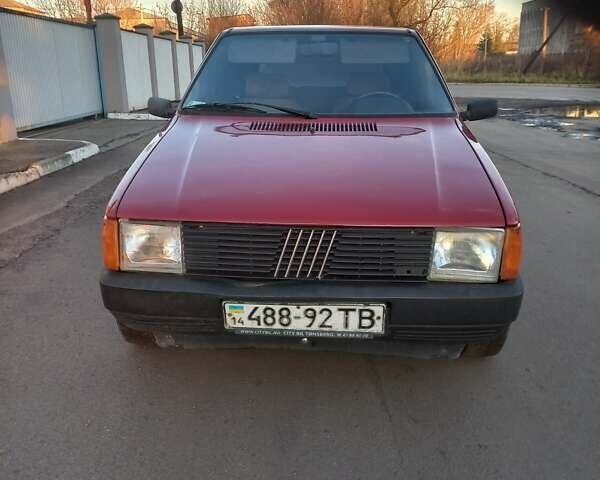 Красный Фиат Уно, объемом двигателя 0 л и пробегом 200 тыс. км за 999 $, фото 1 на Automoto.ua