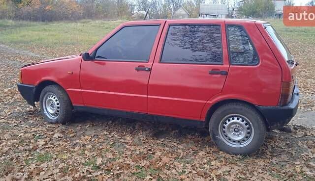 Червоний Фіат Уно, об'ємом двигуна 1.1 л та пробігом 280 тис. км за 900 $, фото 4 на Automoto.ua