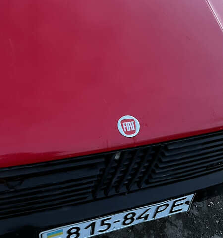 Красный Фиат Уно, объемом двигателя 1.1 л и пробегом 196 тыс. км за 1321 $, фото 5 на Automoto.ua