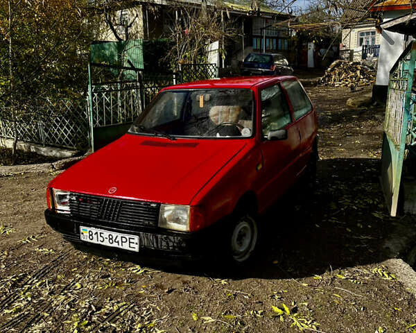 Красный Фиат Уно, объемом двигателя 1.1 л и пробегом 196 тыс. км за 1321 $, фото 10 на Automoto.ua