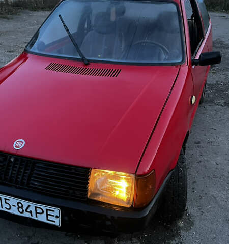 Красный Фиат Уно, объемом двигателя 1.1 л и пробегом 196 тыс. км за 1321 $, фото 4 на Automoto.ua