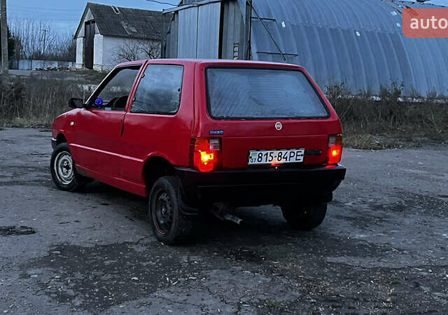 Красный Фиат Уно, объемом двигателя 1.1 л и пробегом 196 тыс. км за 1321 $, фото 3 на Automoto.ua