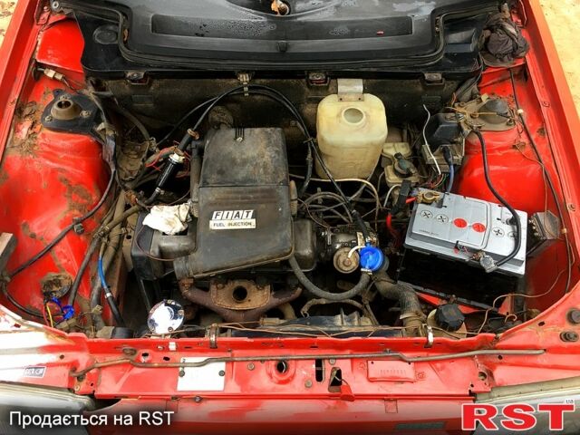 Красный Фиат Уно, объемом двигателя 1 л и пробегом 250 тыс. км за 650 $, фото 4 на Automoto.ua