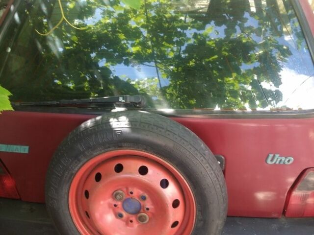 Червоний Фіат Уно, об'ємом двигуна 1 л та пробігом 198 тис. км за 715 $, фото 2 на Automoto.ua