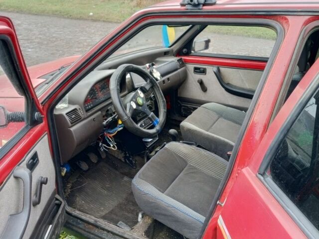 Красный Фиат Уно, объемом двигателя 1 л и пробегом 600 тыс. км за 945 $, фото 5 на Automoto.ua