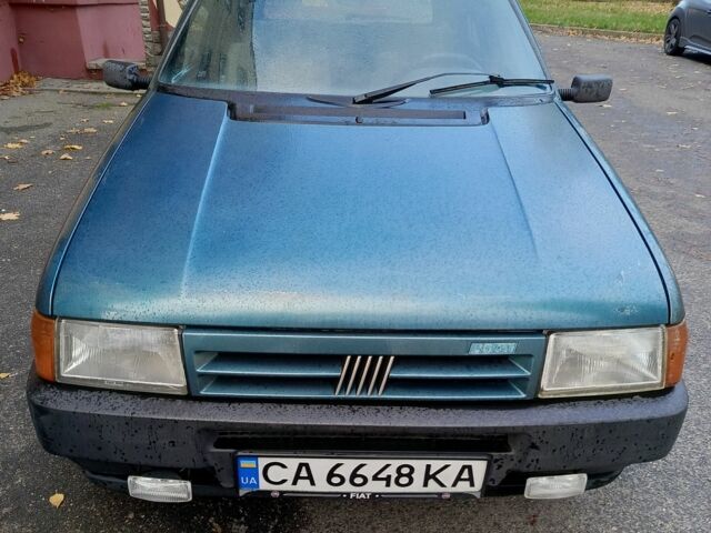 Зеленый Фиат Уно, объемом двигателя 1.4 л и пробегом 320 тыс. км за 770 $, фото 1 на Automoto.ua