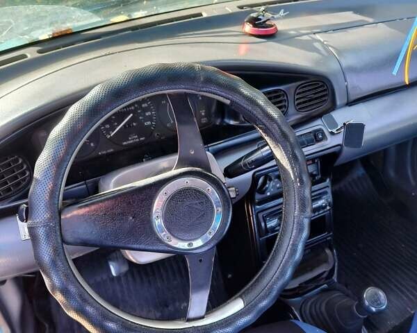 Зеленый Форд Аспира, объемом двигателя 1.3 л и пробегом 270 тыс. км за 1200 $, фото 7 на Automoto.ua