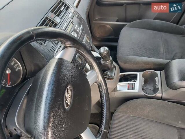 Черный Форд Си-Макс, объемом двигателя 2 л и пробегом 250 тыс. км за 4200 $, фото 9 на Automoto.ua