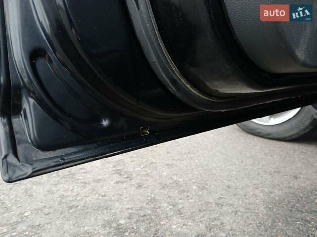 Черный Форд Си-Макс, объемом двигателя 1.8 л и пробегом 224 тыс. км за 3999 $, фото 21 на Automoto.ua