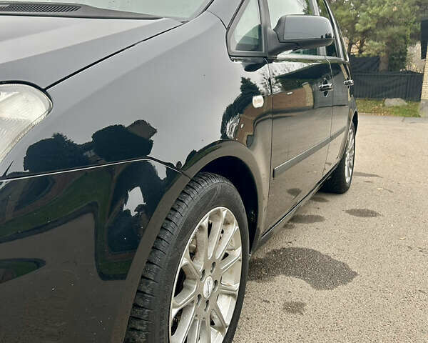 Черный Форд Си-Макс, объемом двигателя 1.8 л и пробегом 253 тыс. км за 5150 $, фото 14 на Automoto.ua